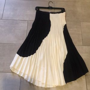 Pleated skirt ,  navy and cream colored